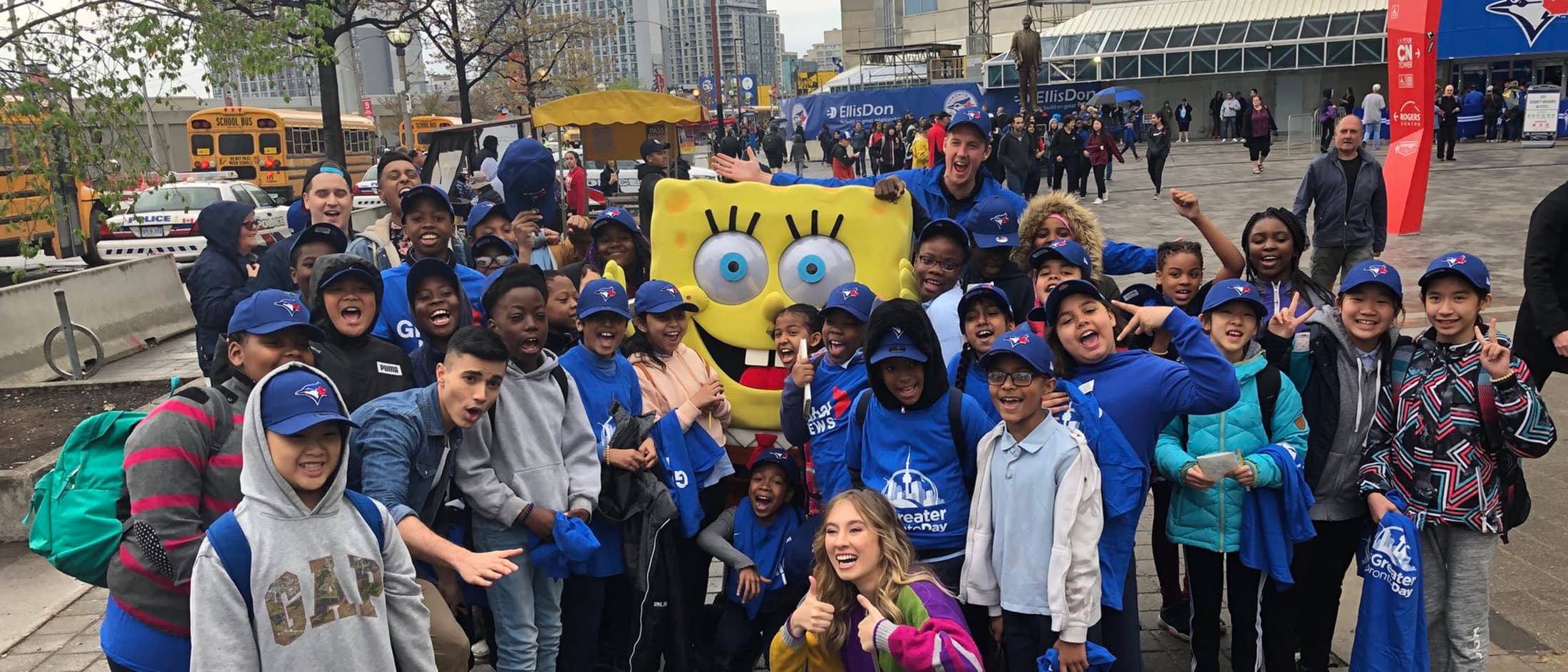Group of kids taking picture with Sponge Bob