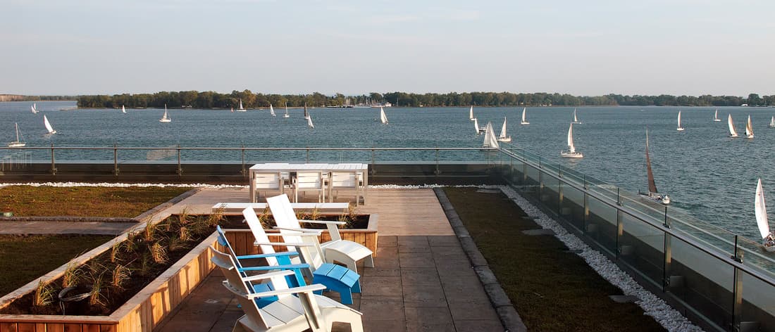 Terrace view of the lake and many sailing boats