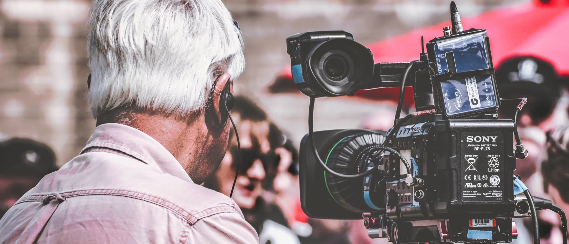 A cameraman operating a camera