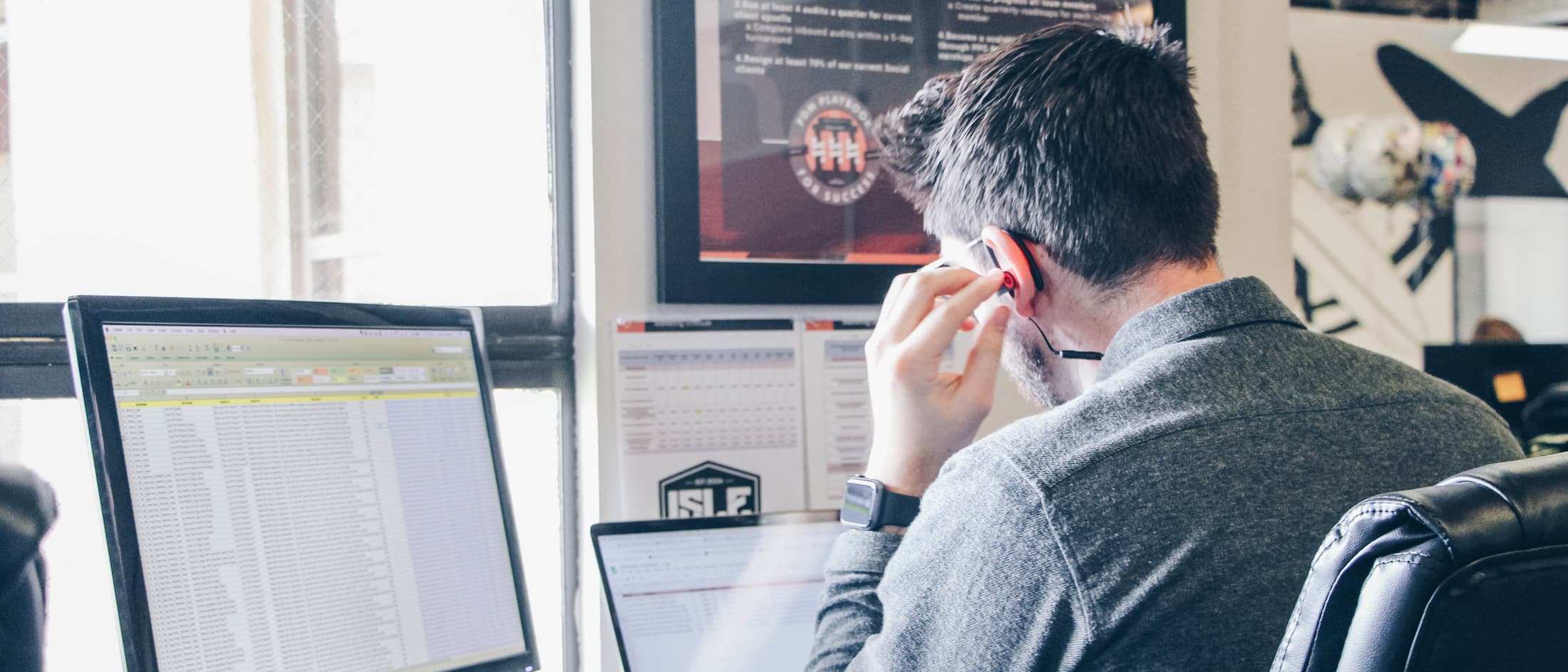 An individual working on a computer